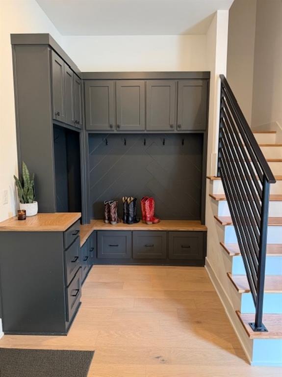 21197 Gatlinburg Road Bullard, TX 75757 - Photo 30 of 40 a kitchen with granite countertop a cabinets and a wooden floor