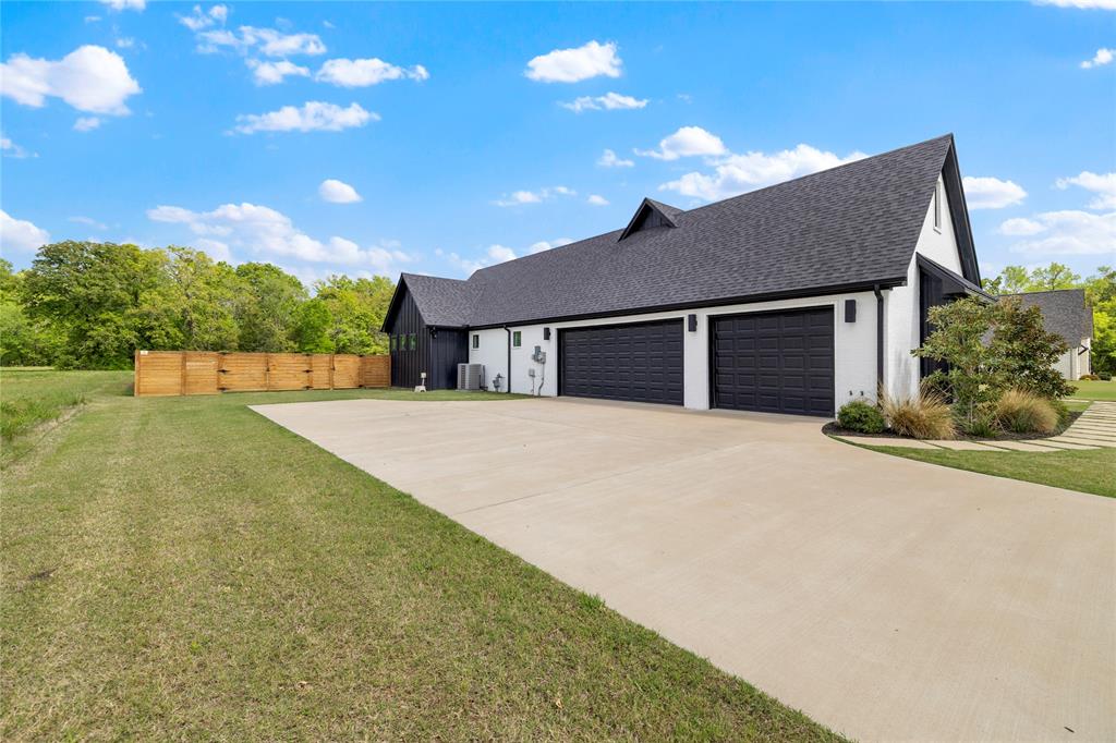 21197 Gatlinburg Road Bullard, TX 75757 - Photo 4 of 40 a house with yard in front of it