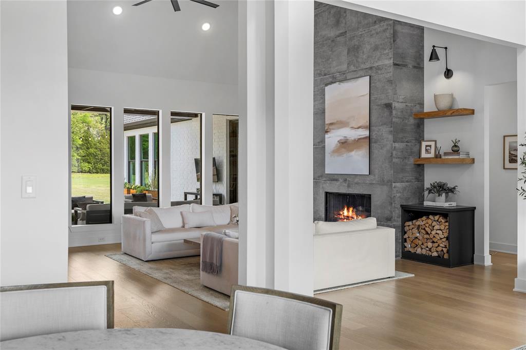 21197 Gatlinburg Road Bullard, TX 75757 - Photo 7 of 40 a living room with furniture and a fireplace