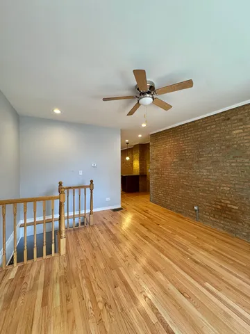 a view of a living room and wooden floor