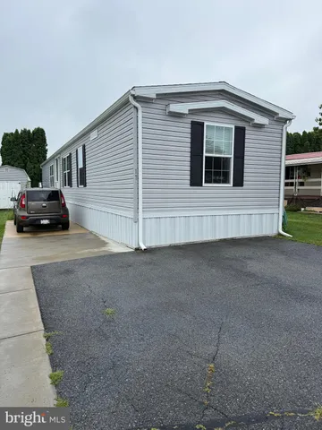 a car parked in front of a house