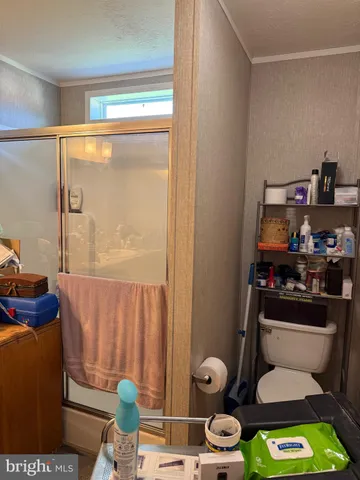 a bathroom with a toilet