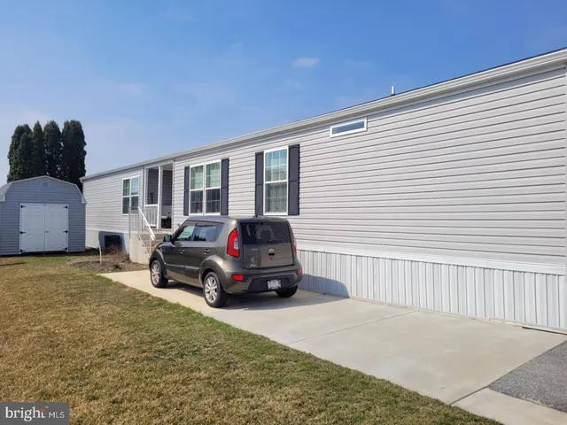 a car parked in front of a house