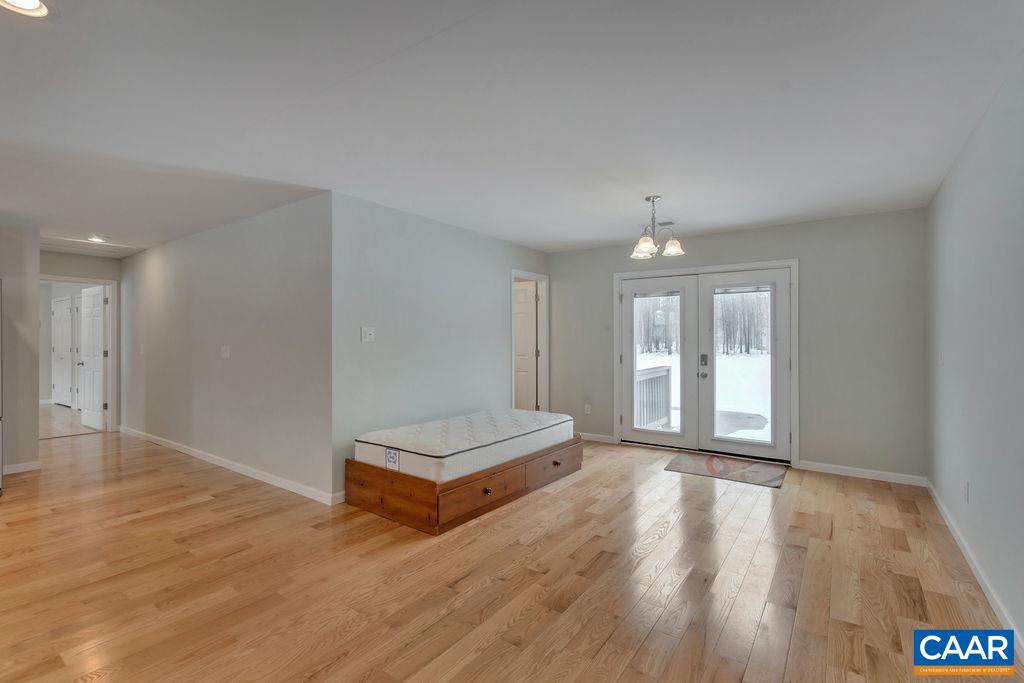 759 Mt Torrey Road Lyndhurst, VA 22952 - Photo 26 of 47 a view of an empty room with wooden floor and a window