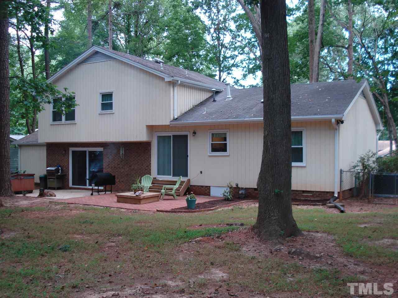 8712 Hidden View Court Raleigh, NC 27613 - Photo 17 of 17 a front view of a house with patio