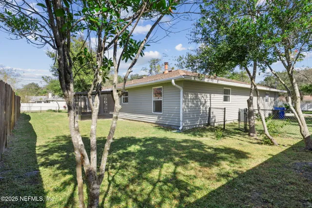 a view of a lake with a big yard