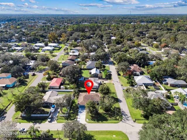 a view of a swimming pool with a garden
