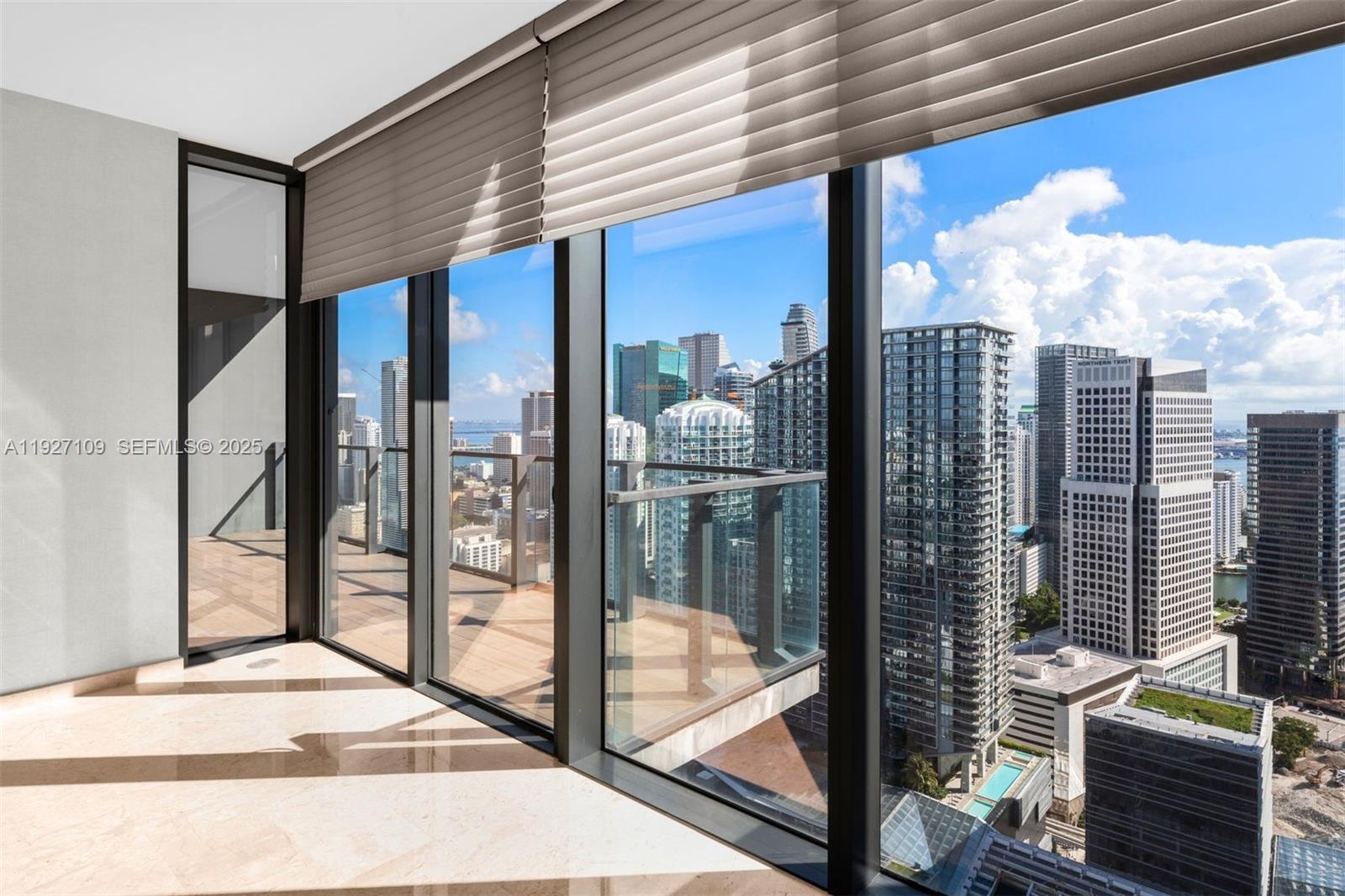 88 Southwest 7th Street, Unit 3907 Miami, FL 33130 - Photo 16 of 33 a balcony view with a glass door