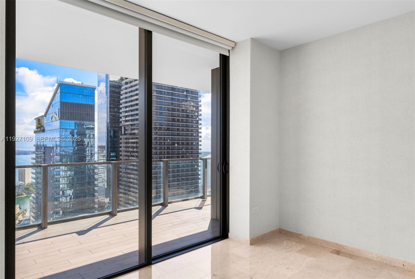 88 Southwest 7th Street, Unit 3907 Miami, FL 33130 - Photo 18 of 33 a view of balcony with brick walls