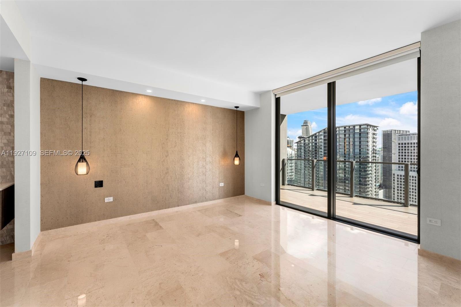 88 Southwest 7th Street, Unit 3907 Miami, FL 33130 - Photo 19 of 33 a view of a room with large windows