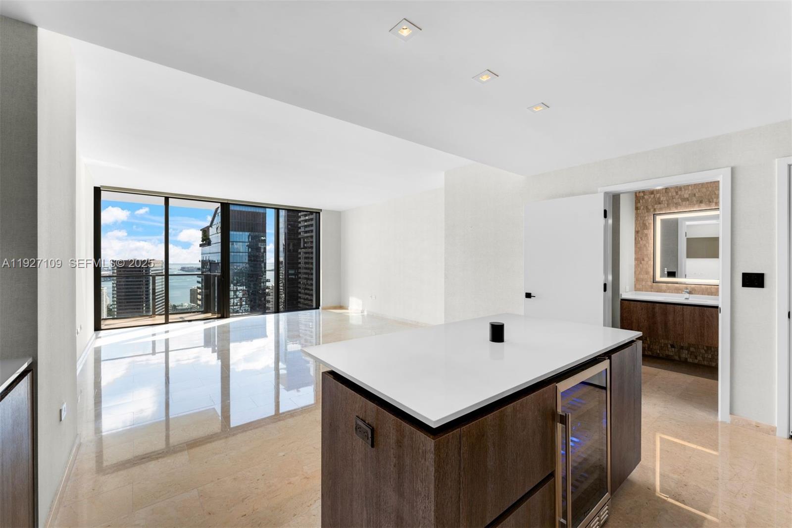 88 Southwest 7th Street, Unit 3907 Miami, FL 33130 - Photo 5 of 33 a bathroom with a sink and a window