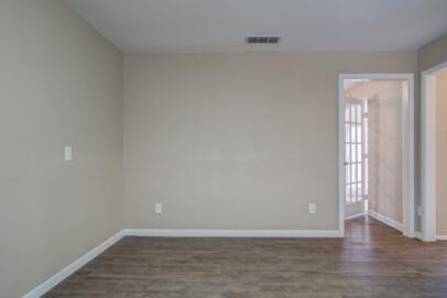 2611 49th Street Lubbock, TX 79413 - Photo 28 of 35 a view of an empty room and wooden floor