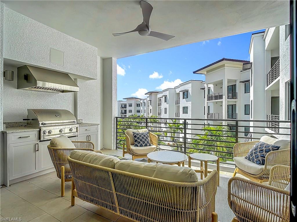 1125 Central Avenue, Unit 462 Naples, FL 34102 - Photo 28 of 48 a living room with furniture