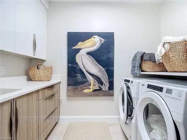 a bathroom with a sink a mirror and toilet