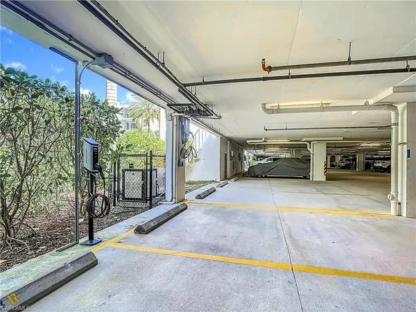 a lobby with furniture and window