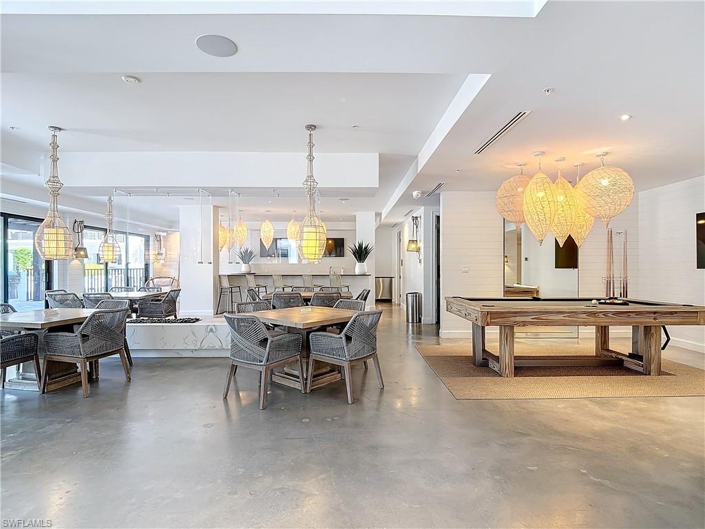1125 Central Avenue, Unit 462 Naples, FL 34102 - Photo 40 of 48 a lobby with furniture and window