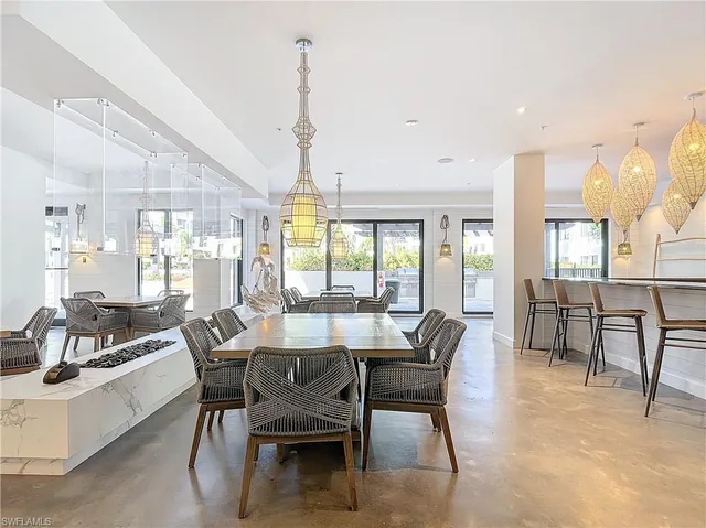 a room with furniture and a flat screen tv