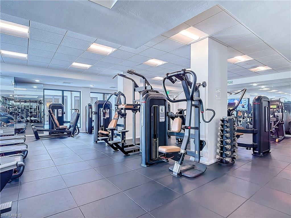 1125 Central Avenue, Unit 462 Naples, FL 34102 - Photo 48 of 48 a view of a room with gym equipment