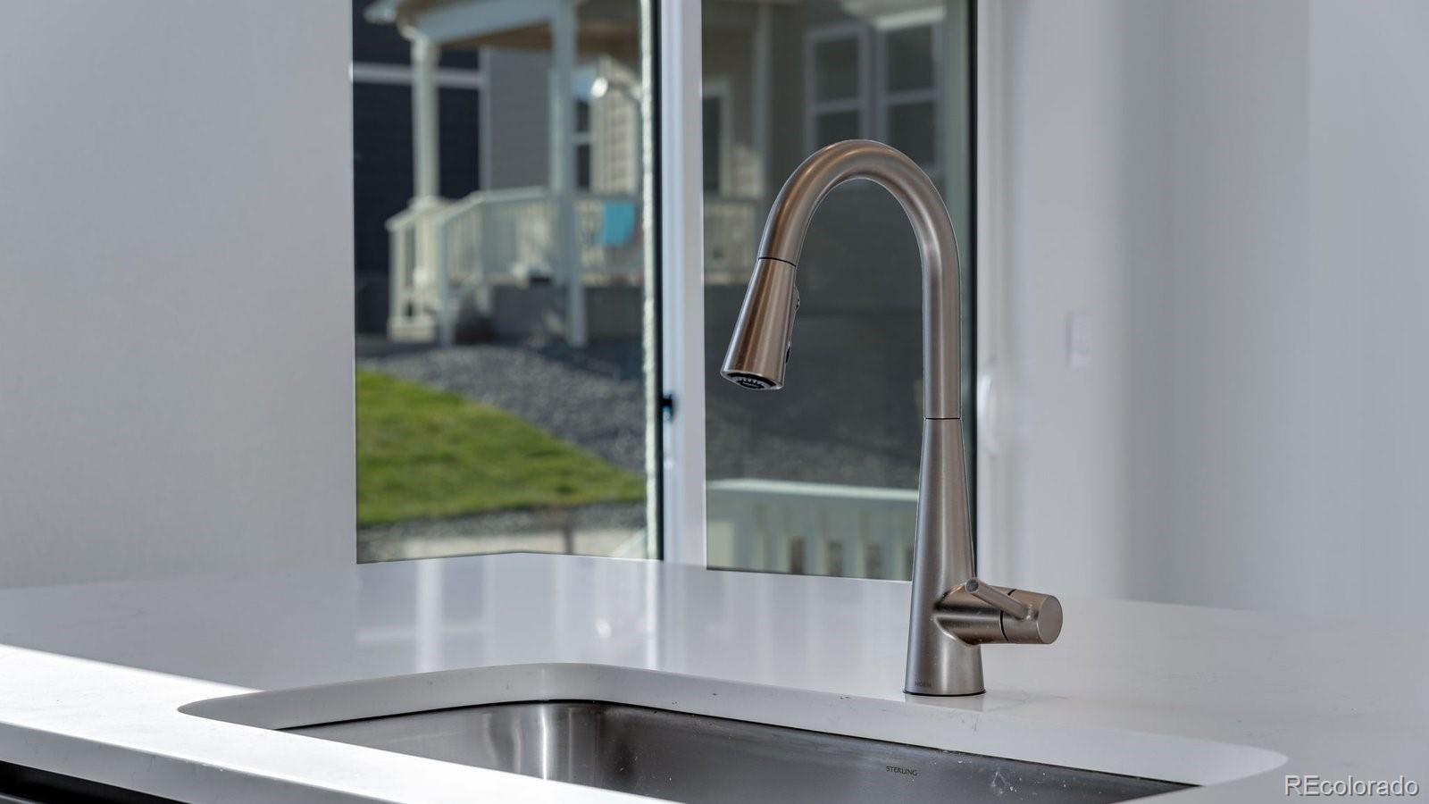 3434 Belleville Ridge Road Elizabeth, CO 80107 - Photo 20 of 48 a view of bathroom with sink and mirror
