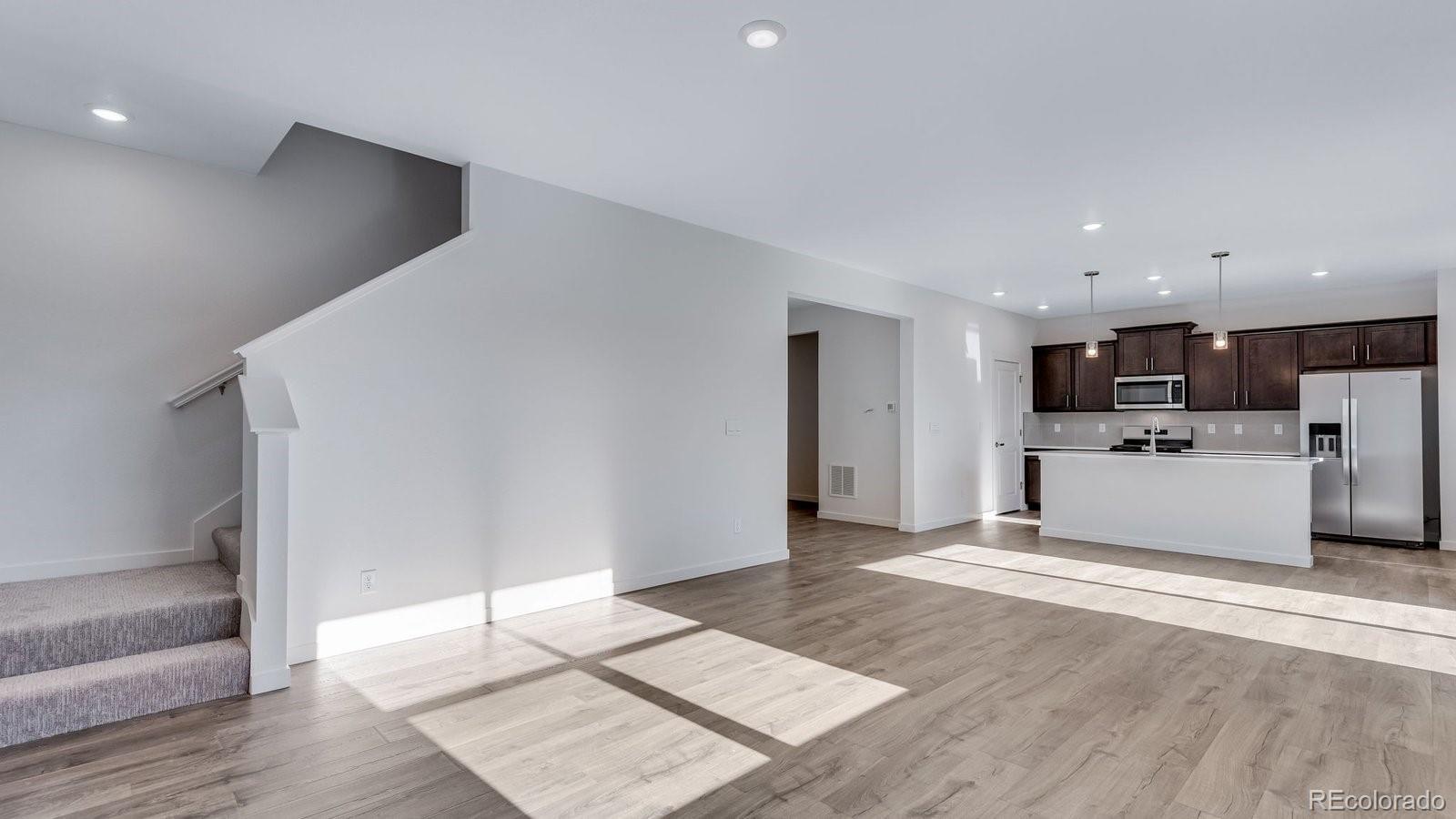 3434 Belleville Ridge Road Elizabeth, CO 80107 - Photo 28 of 48 a view of kitchen with wooden floor