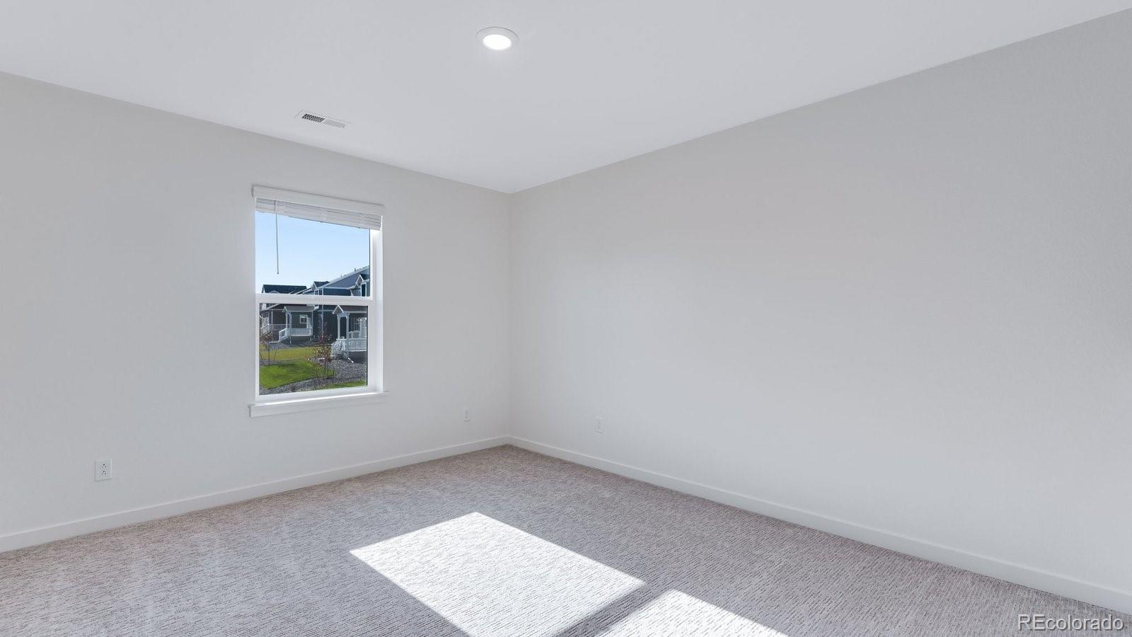 3434 Belleville Ridge Road Elizabeth, CO 80107 - Photo 31 of 48 an empty room with a window