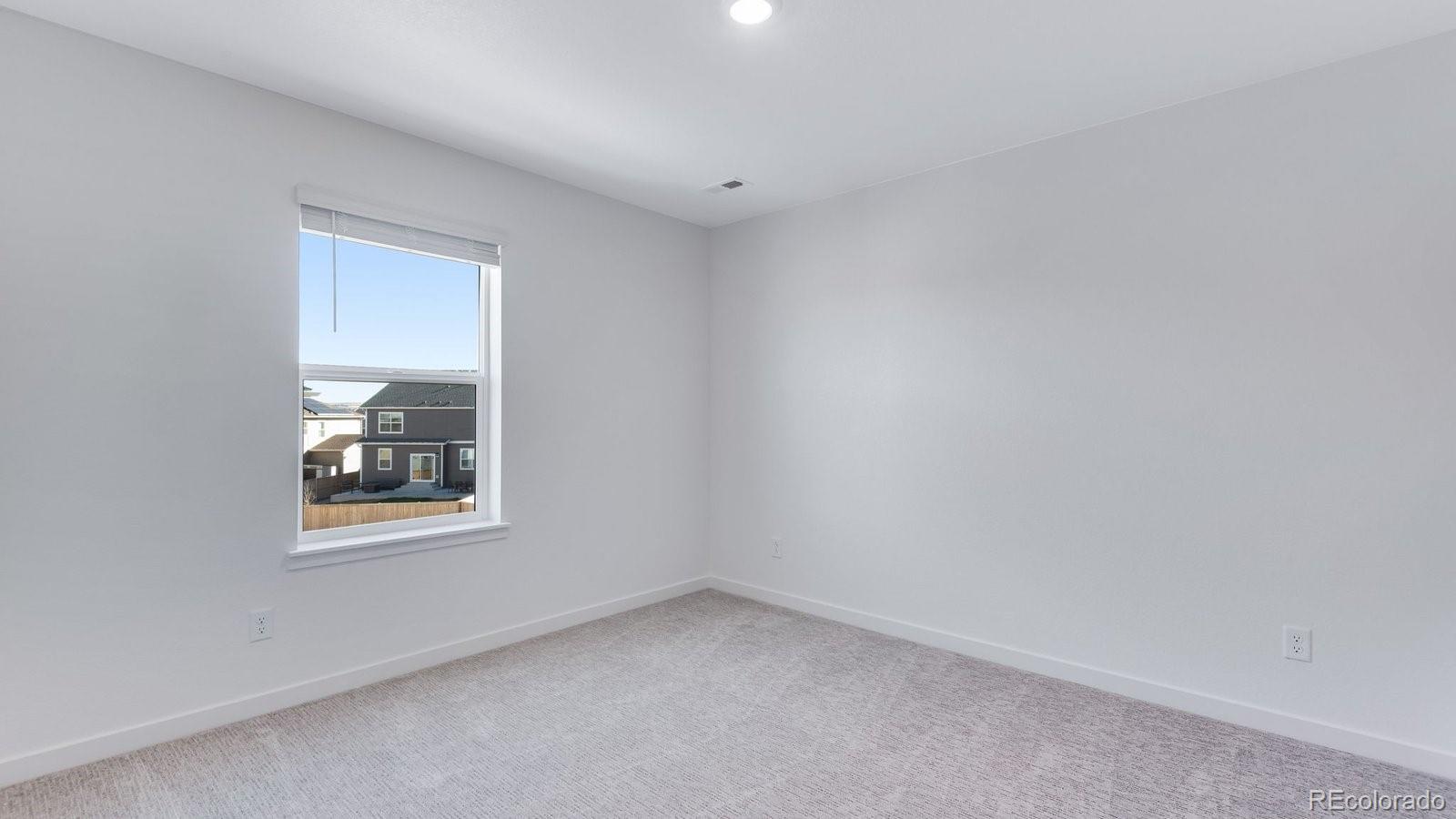 3434 Belleville Ridge Road Elizabeth, CO 80107 - Photo 35 of 48 an empty room with a window