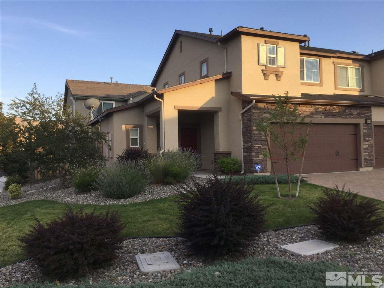 2060 Echo Valley Parkway Reno, NV 89521 - Photo 1 of 1 a front view of a house with a garden