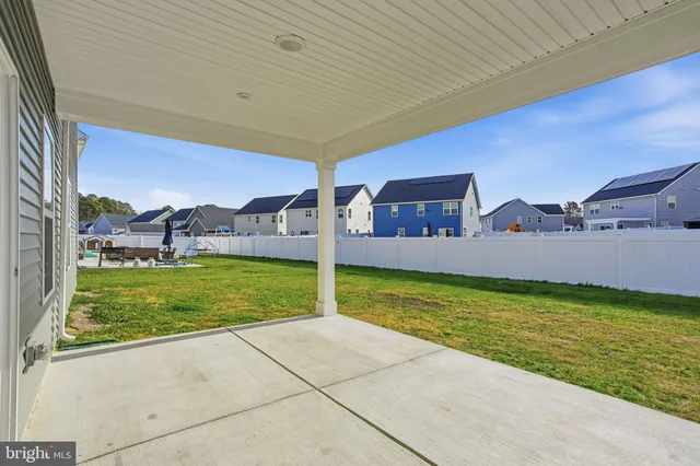a view of an house with backyard and outdoor space