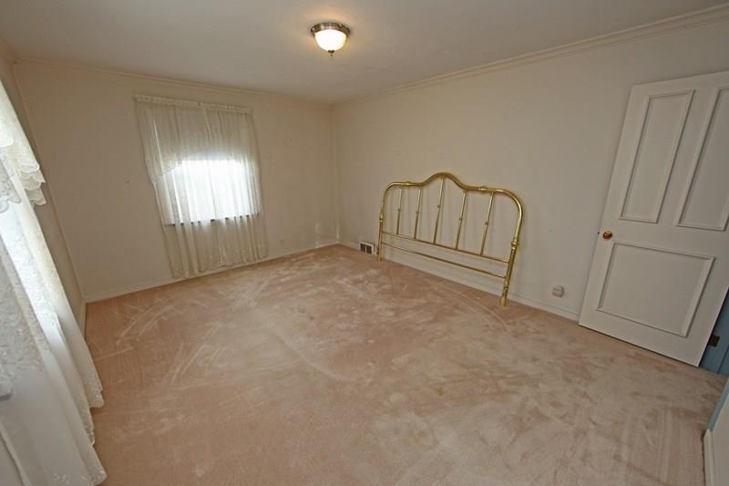 4470 Mt Troy Road Pittsburgh, PA 15214 - Photo 14 of 20 Main Level Master Bedroom... That's a King Sized Bed Headboard!