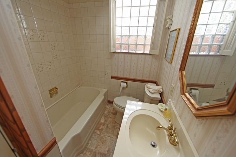 4470 Mt Troy Road Pittsburgh, PA 15214 - Photo 15 of 20 Main Hall Bathroom.. The toilet has an elongated bowl