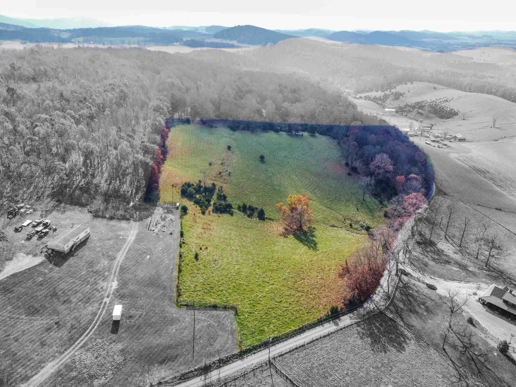 Lot 1 Gibbs Run Lane Raphine, VA 24472 - Photo 1 of 7 a view of a wooden house with a yard