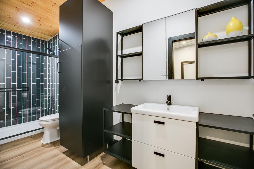 19621 Bluff Road Christoval, TX 76935 - Photo 18 of 74 a view of bathroom with a sink toilet and mirror