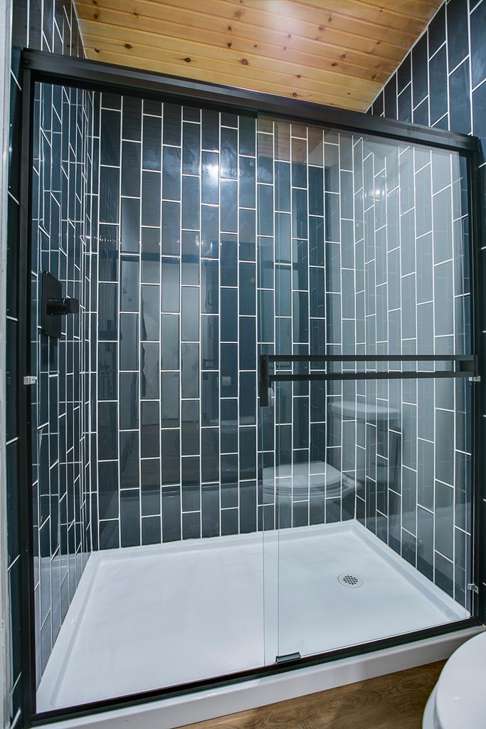 19621 Bluff Road Christoval, TX 76935 - Photo 19 of 74 a bathroom with a bathtub and shower