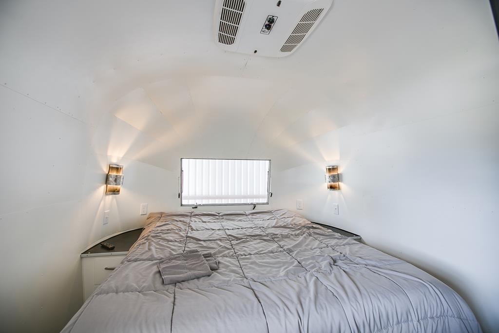 19621 Bluff Road Christoval, TX 76935 - Photo 51 of 74 a bedroom with a bed and window