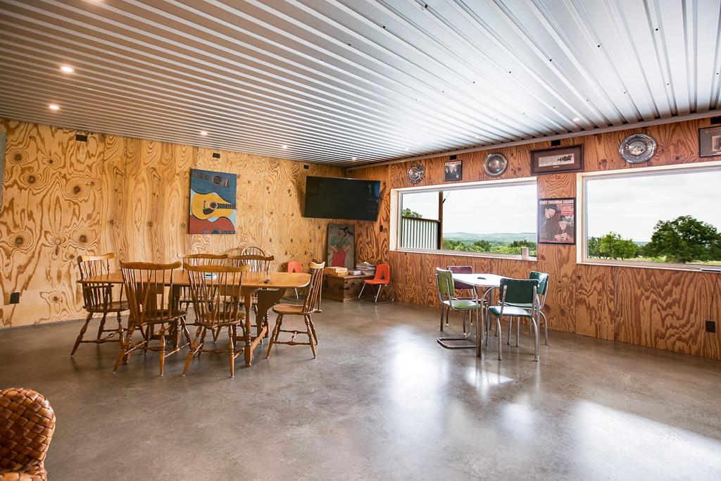 19621 Bluff Road Christoval, TX 76935 - Photo 61 of 74 a dining room with furniture window and outside view