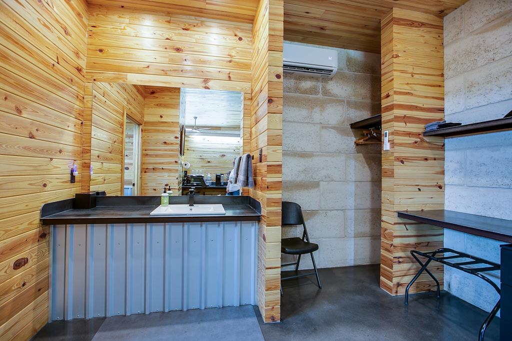 19621 Bluff Road Christoval, TX 76935 - Photo 71 of 74 a bathroom with a sink and a mirror