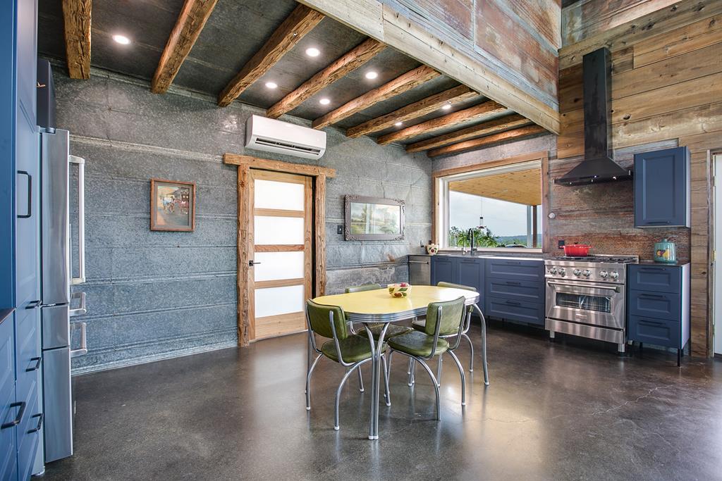 19621 Bluff Road Christoval, TX 76935 - Photo 10 of 74 a view of a dining room with furniture window and wooden floor