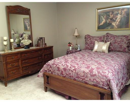 11 Dotys Mill Road Acushnet, MA 02743 - Photo 12 of 26 a large bed sitting in a bedroom and dresser