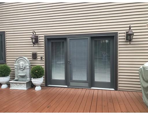 11 Dotys Mill Road Acushnet, MA 02743 - Photo 18 of 26 a view of a deck with dining table and chairs