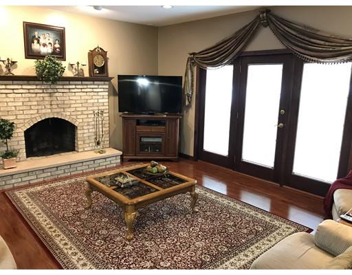 11 Dotys Mill Road Acushnet, MA 02743 - Photo 5 of 26 a living room with furniture and a fireplace
