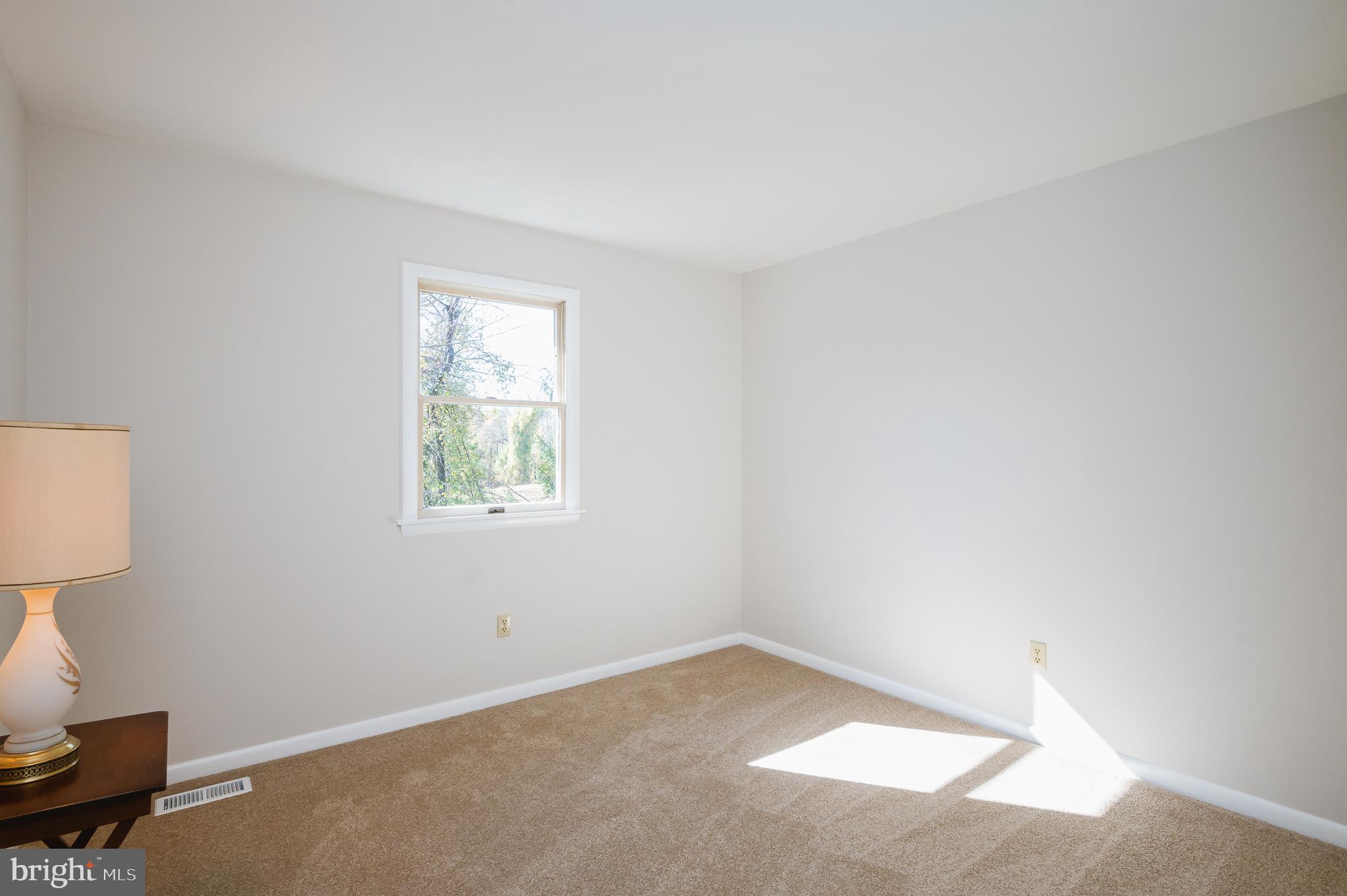 9901 Maidbrook Road Parkville, MD 21234 - Photo 19 of 37 Bedroom - New, neutral-toned carpet