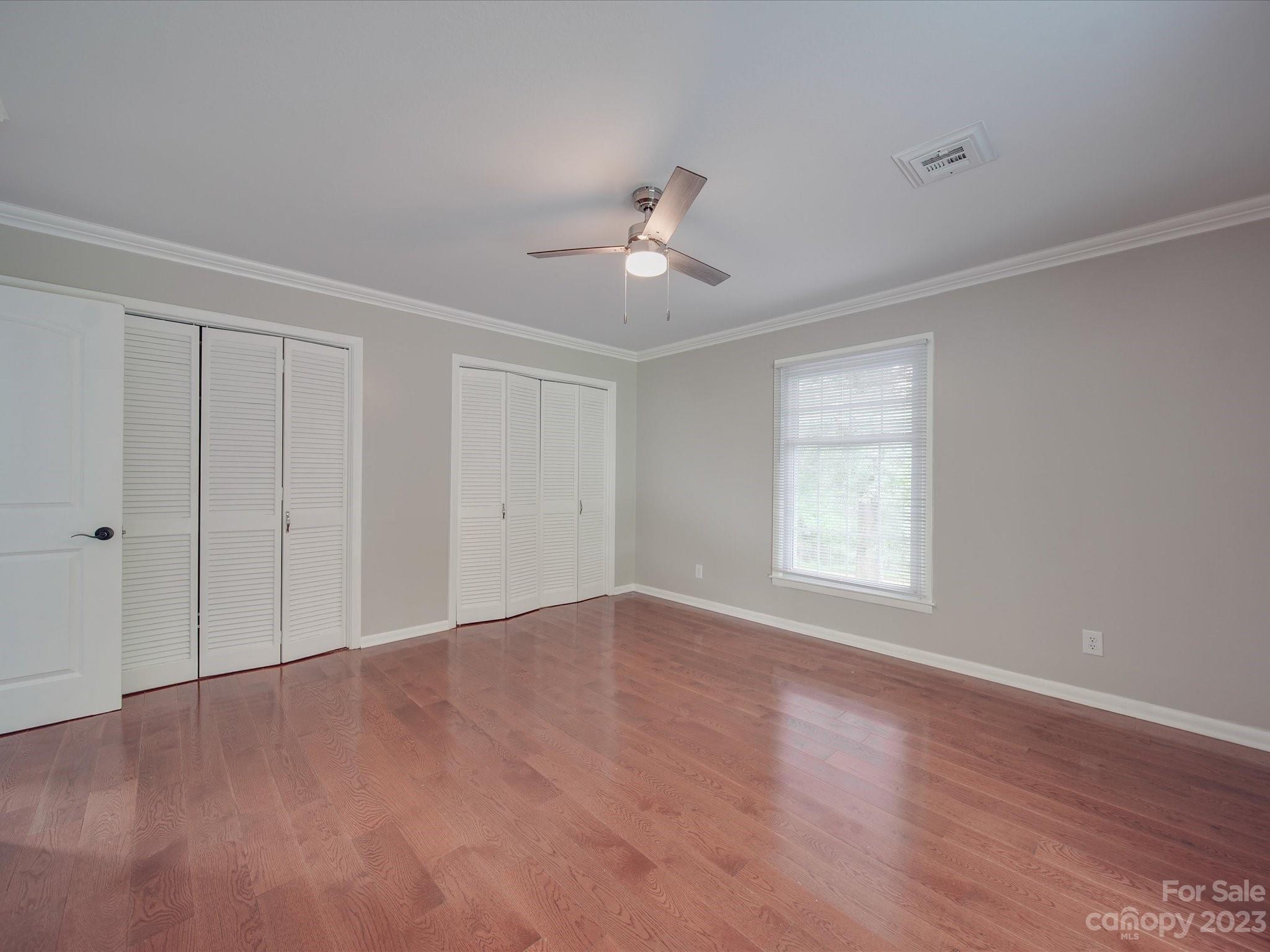 1035 Blake Road Albemarle, NC 28001 - Photo 17 of 45 wooden floor in an empty room with a window