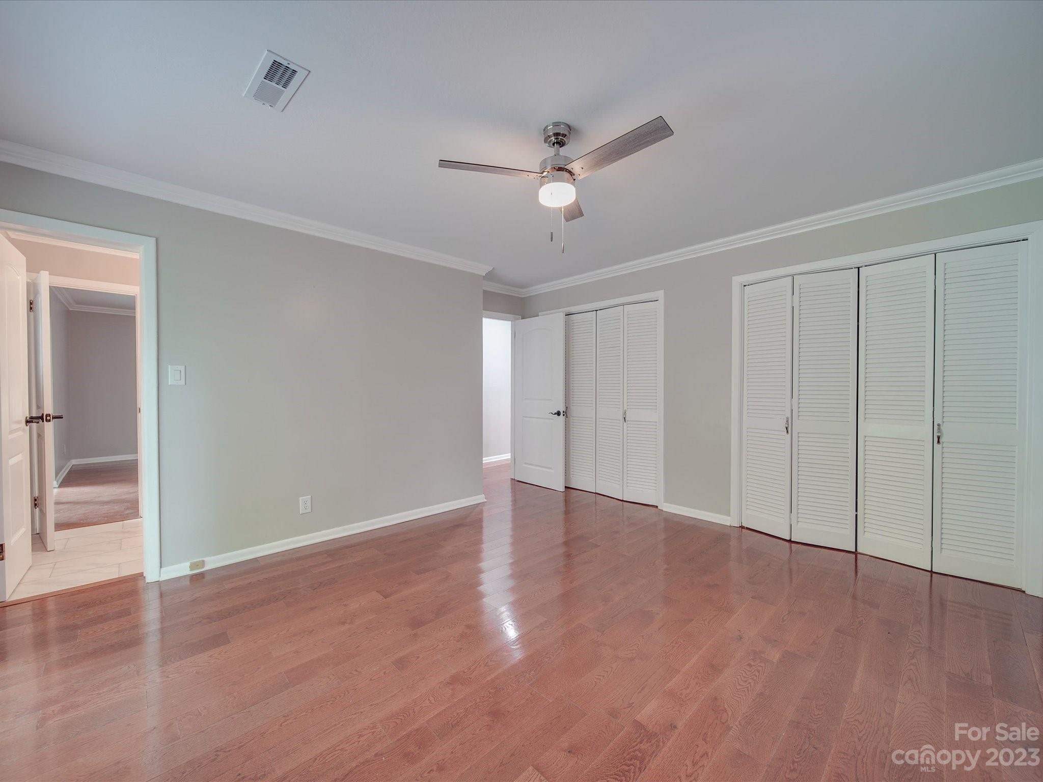 1035 Blake Road Albemarle, NC 28001 - Photo 18 of 45 a view of an empty room with wooden floor
