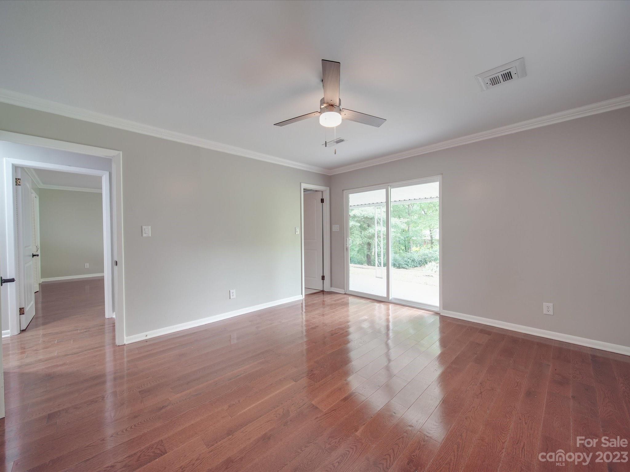 1035 Blake Road Albemarle, NC 28001 - Photo 24 of 45 wooden floor in an empty room with a window