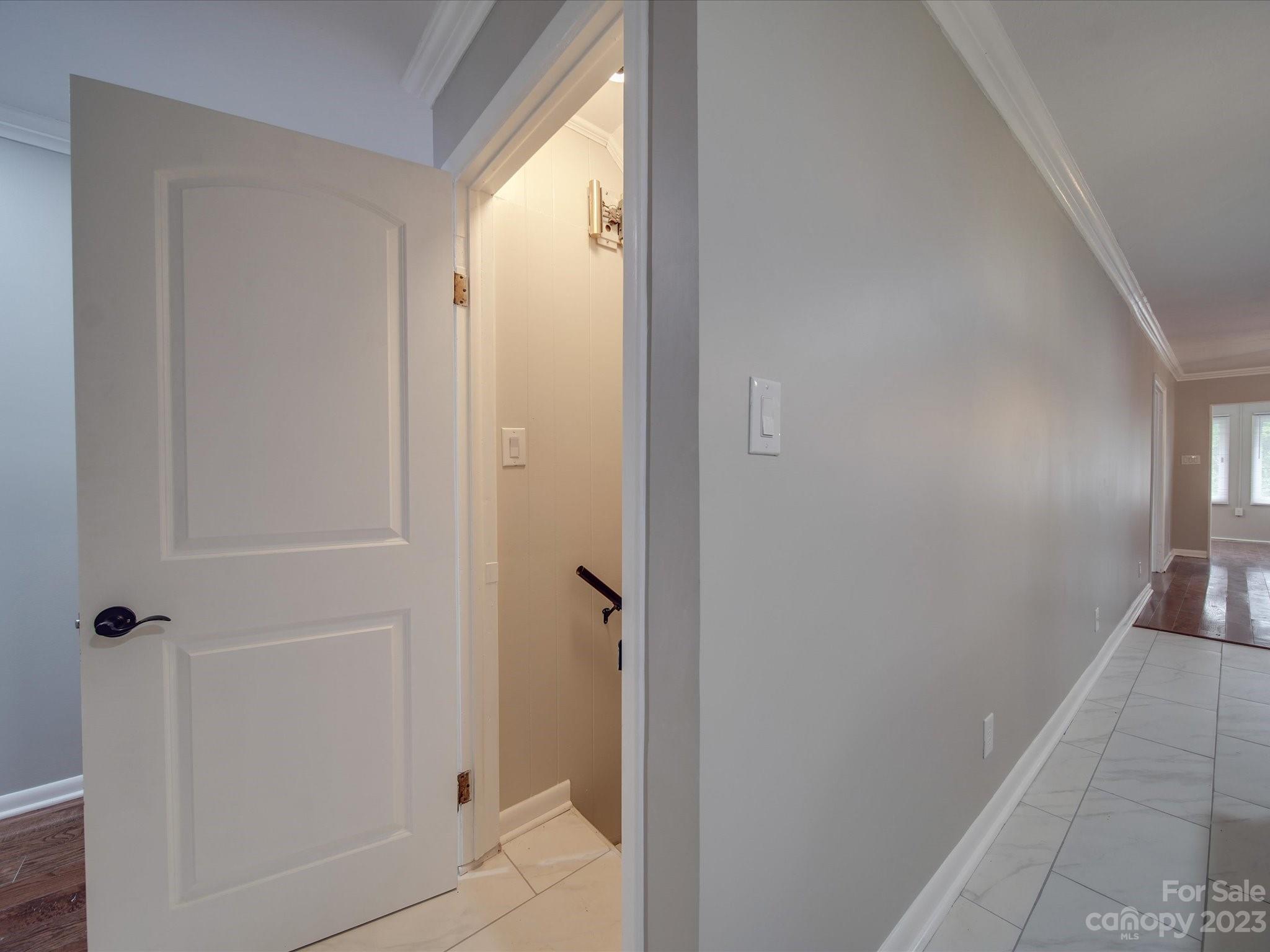 1035 Blake Road Albemarle, NC 28001 - Photo 27 of 45 a view of a hallway with a glass door