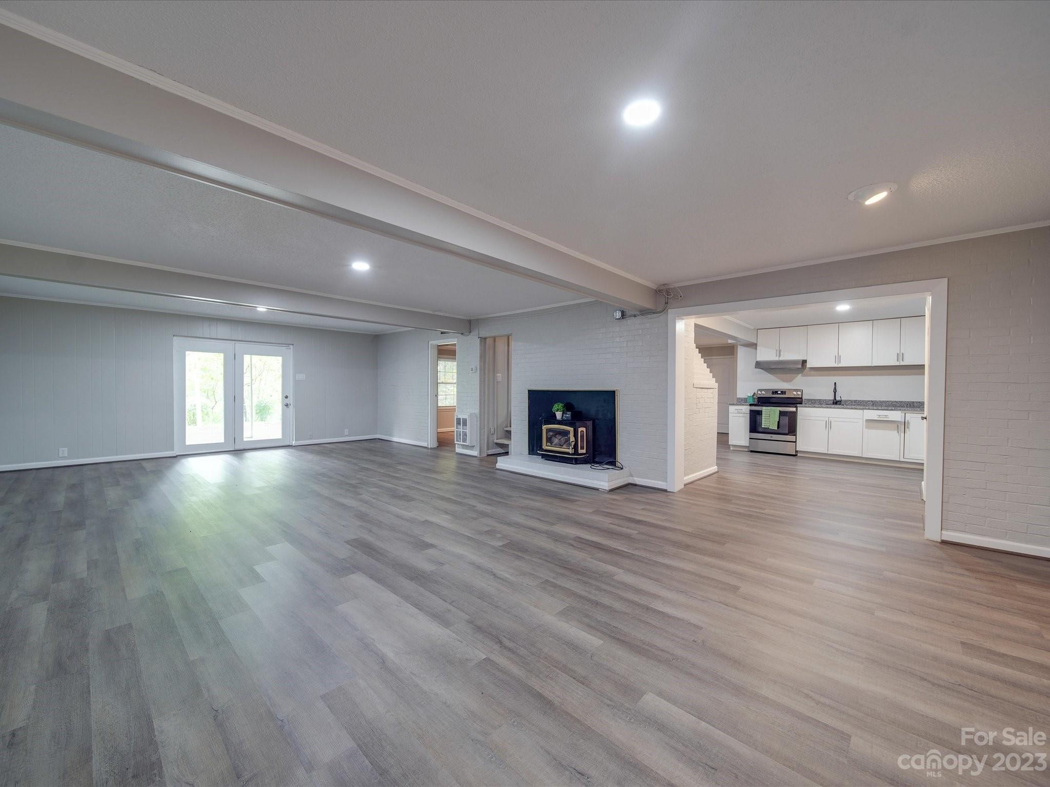 1035 Blake Road Albemarle, NC 28001 - Photo 28 of 45 a view of empty room with wooden floor and a window