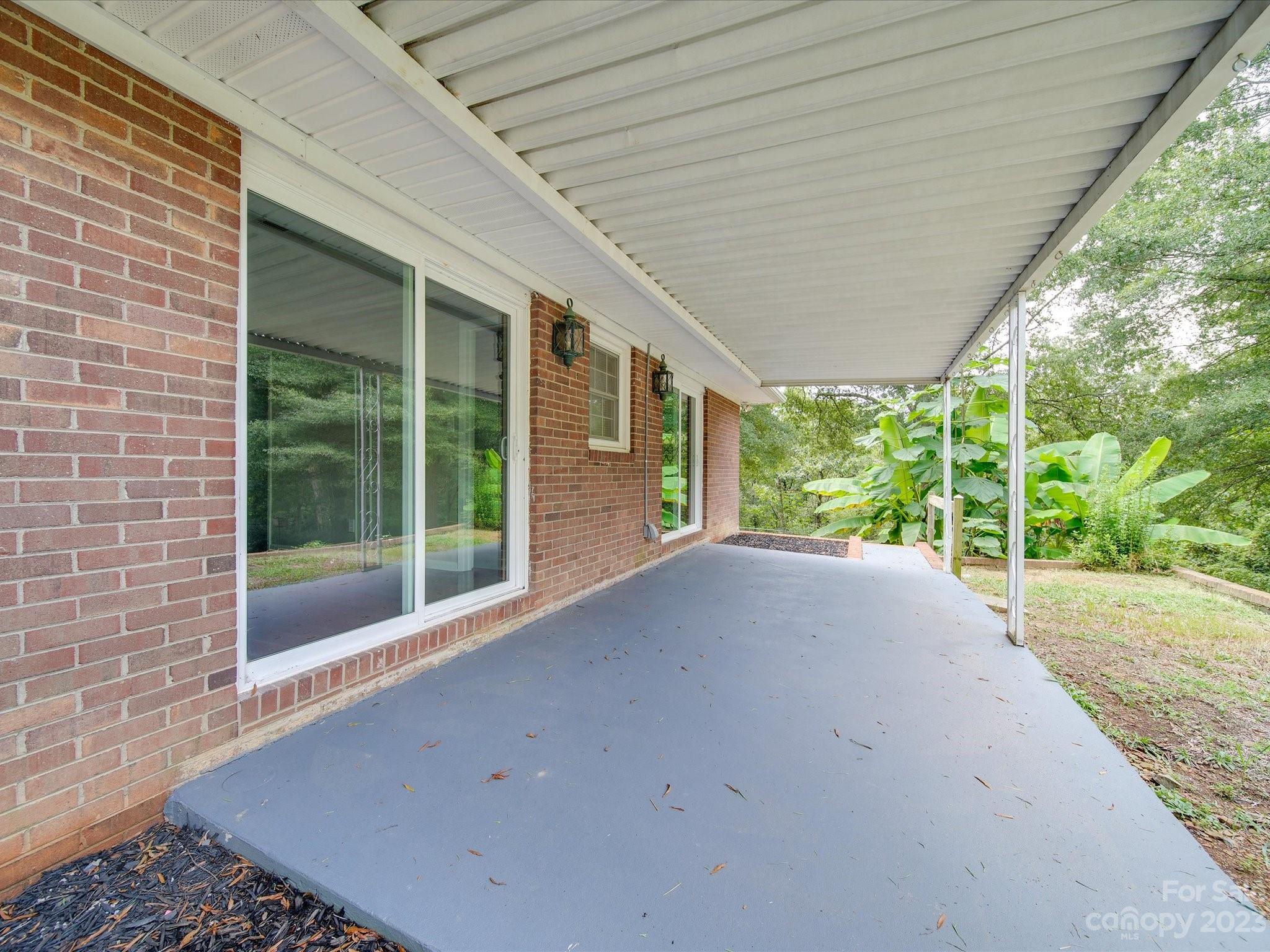 1035 Blake Road Albemarle, NC 28001 - Photo 37 of 45 a view of a house with a yard