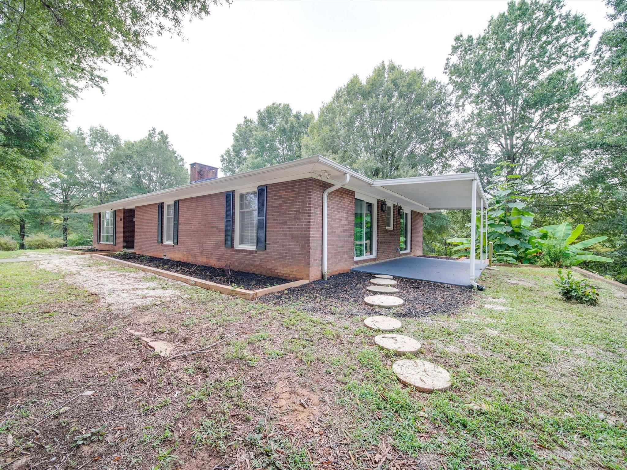 1035 Blake Road Albemarle, NC 28001 - Photo 44 of 45 a view of a house with a yard