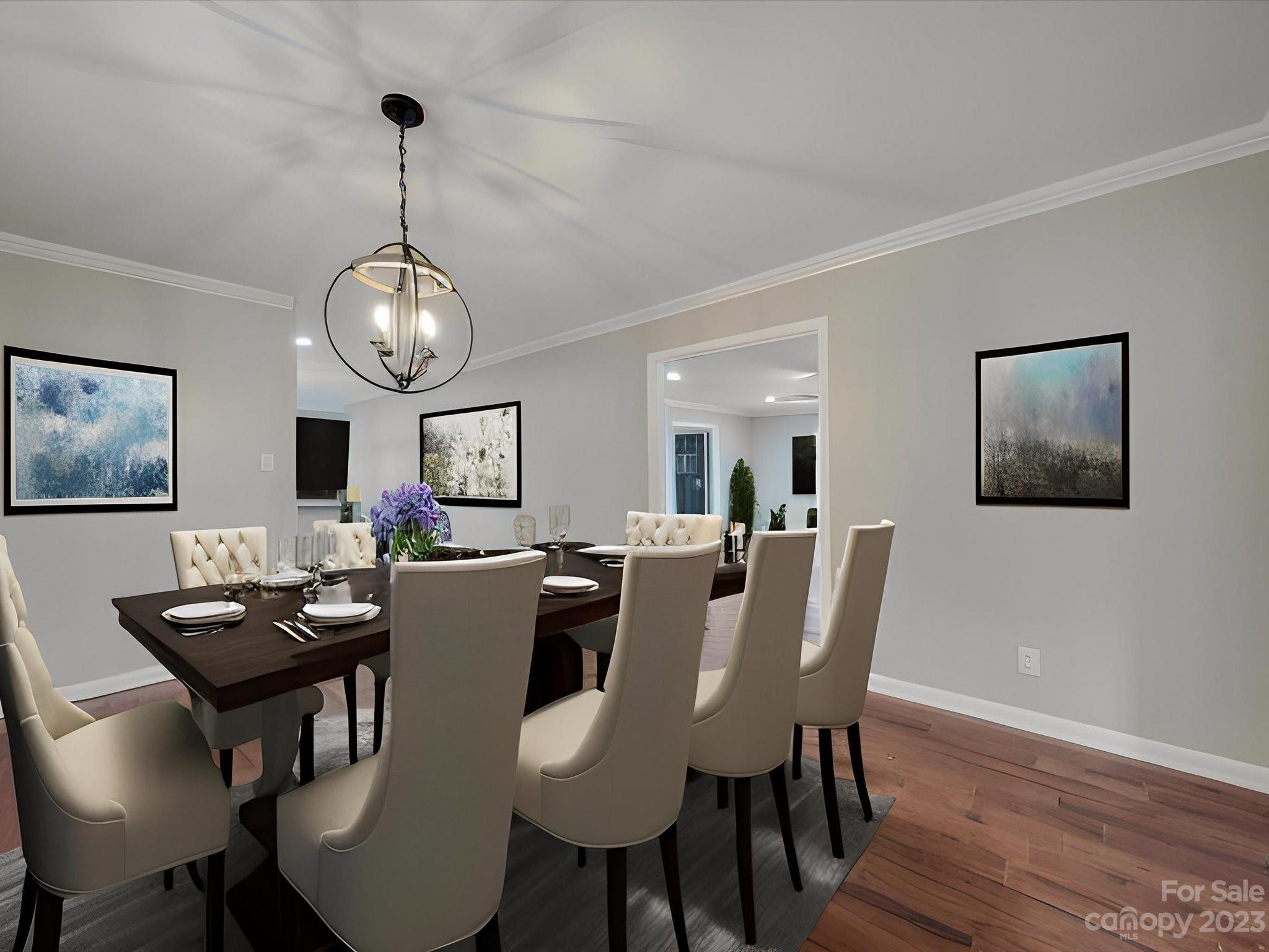 1035 Blake Road Albemarle, NC 28001 - Photo 6 of 45 a view of a dining room with furniture wooden floor and chandelier
