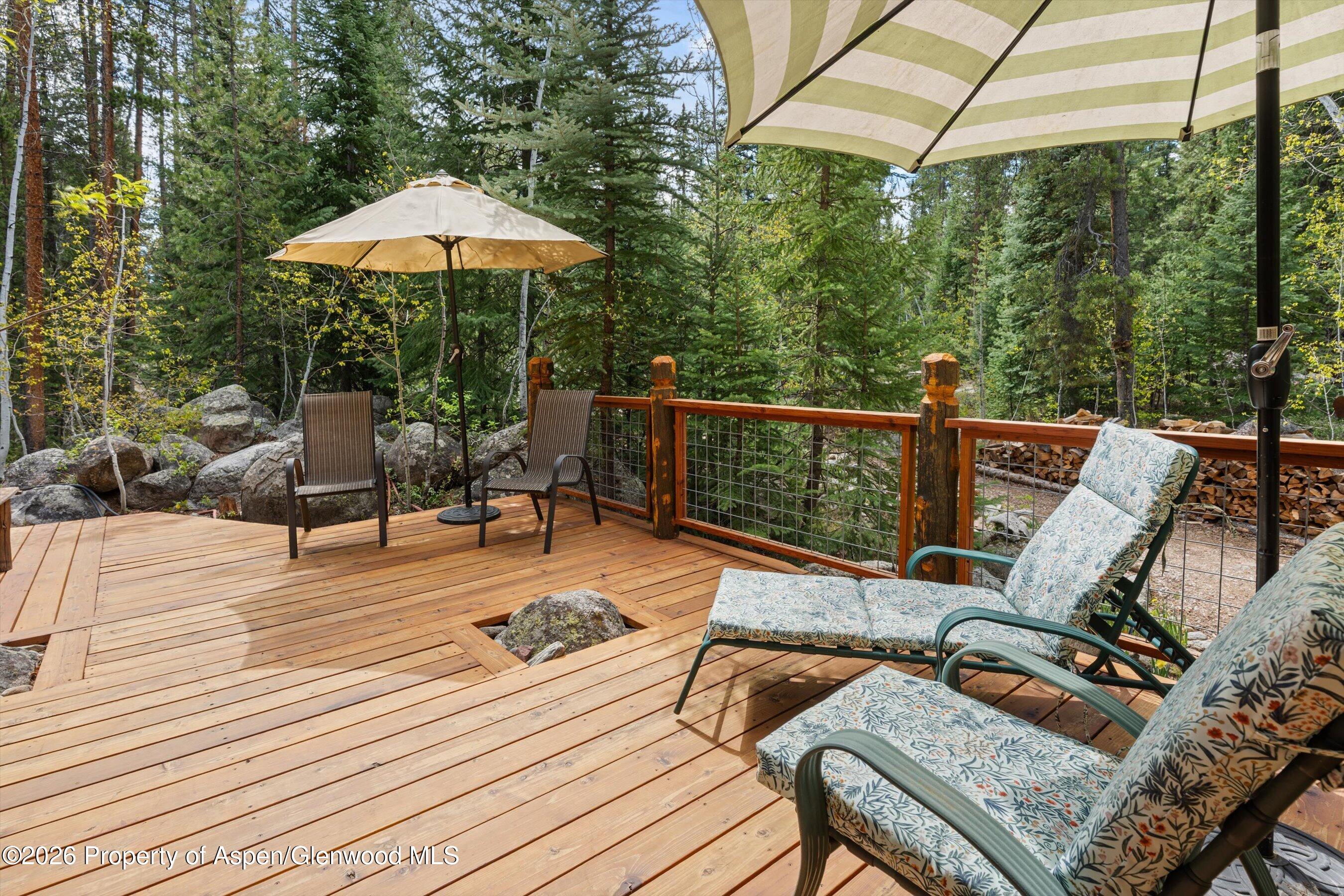 26608 Frying Pan Road Meredith, CO 81642 - Photo 7 of 49 a view of a patio with wooden floor